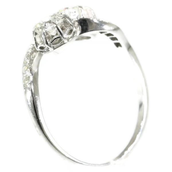 Vintage love ring so called toi et moi or cross over ring with diamonds by Artista Sconosciuto