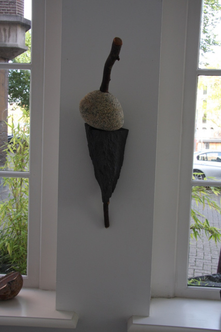 Put together granit/wood by Ton Kalle