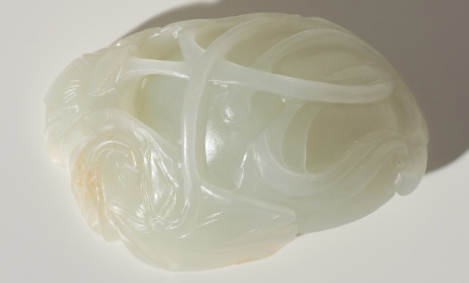 A white jade ‘Lotus Seedpod and Bug’ carving, Qing dynasty, 18th century by Artiste Inconnu