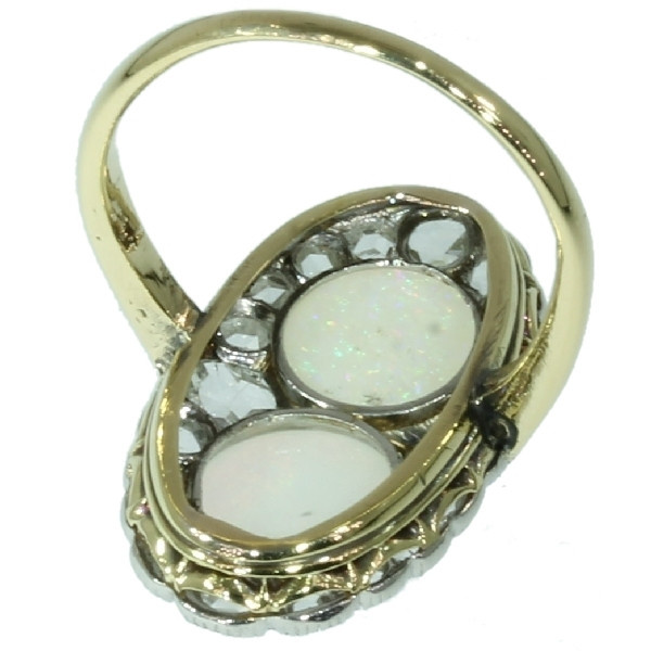 Antique Victorian engagement ring with rose cut diamonds and cabochon opals by Artista Sconosciuto