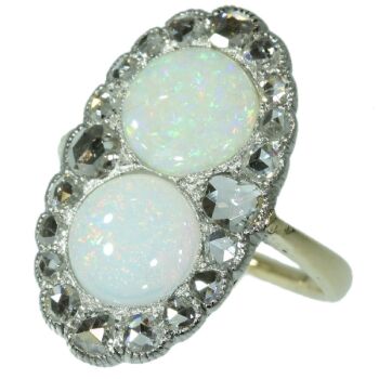 Antique Victorian engagement ring with rose cut diamonds and cabochon opals by Unknown artist
