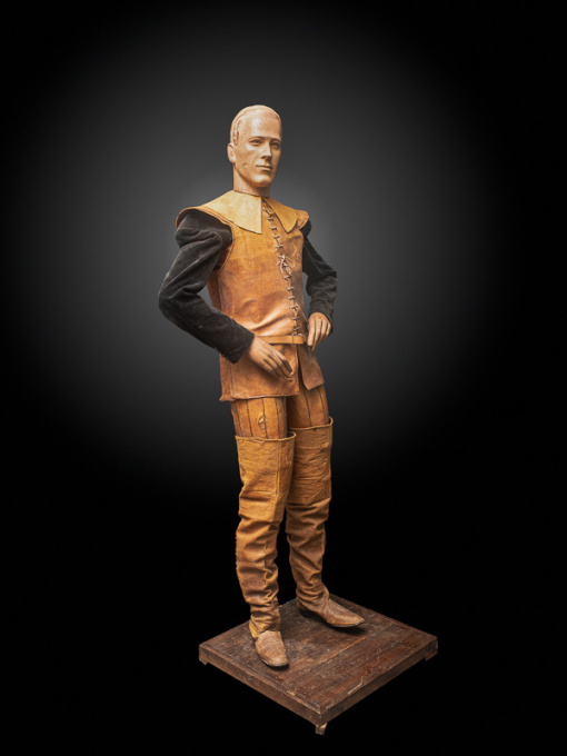 Lifesize Vintage Wooden Mannequin featuring articulated arms and legs, a ceramic head and full Musketeer outfit by Artista Desconhecido