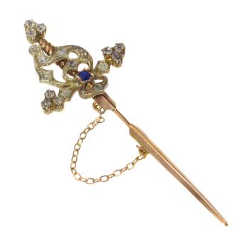 Vintage pin in the form of a sword set with diamonds and a sapphire by Unknown artist