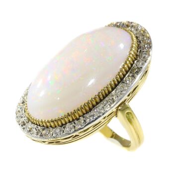 Antique large opal and diamonds ring by Artista Sconosciuto