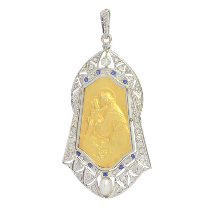 Vintage 1910's medal 18K gold pendant set with diamonds sapphires and pearl St. Anthony of Padua depicted holding the Child Jesus by Artista Sconosciuto