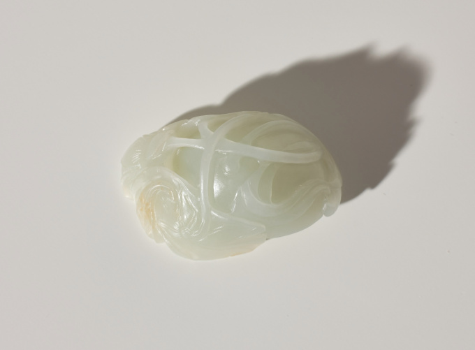 A white jade ‘Lotus Seedpod and Bug’ carving, Qing dynasty, 18th century by Artiste Inconnu