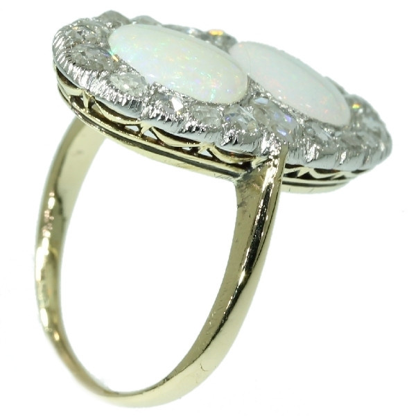 Antique Victorian engagement ring with rose cut diamonds and cabochon opals by Artista Sconosciuto
