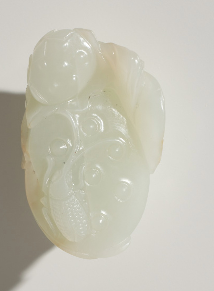 A white jade ‘Lotus Seedpod and Bug’ carving, Qing dynasty, 18th century by Artiste Inconnu
