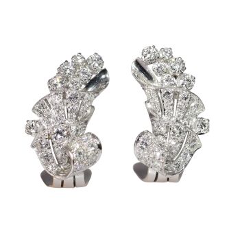 Elegant 1950s Platinum Diamond Earclips with Art Deco Flair by Unknown artist