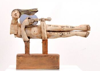 Flying figure with guitar by Christy Keeney