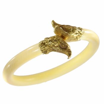 French Late Victorian antique ivory bangle with big gold eagle head ornaments by Unknown artist