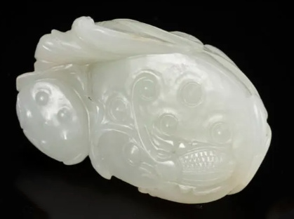 A white jade ‘Lotus Seedpod and Bug’ carving, Qing dynasty, 18th century by Artiste Inconnu