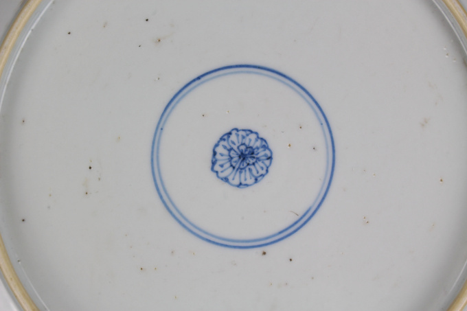 A Chinese powder-blue-ground blue and white ‘Budai’ dish, Kangxi period by Artiste Inconnu