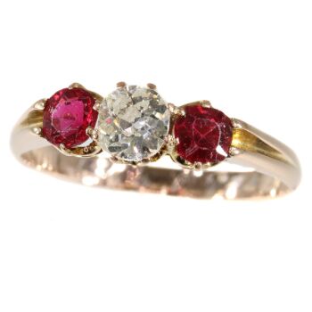 Antique ring with old mine brilliant cut diamond and two red strass stones by Unknown artist