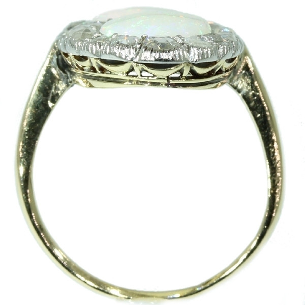 Antique Victorian engagement ring with rose cut diamonds and cabochon opals by Artista Sconosciuto
