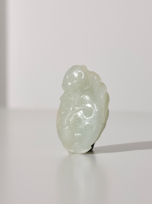 A white jade ‘Lotus Seedpod and Bug’ carving, Qing dynasty, 18th century by Artiste Inconnu
