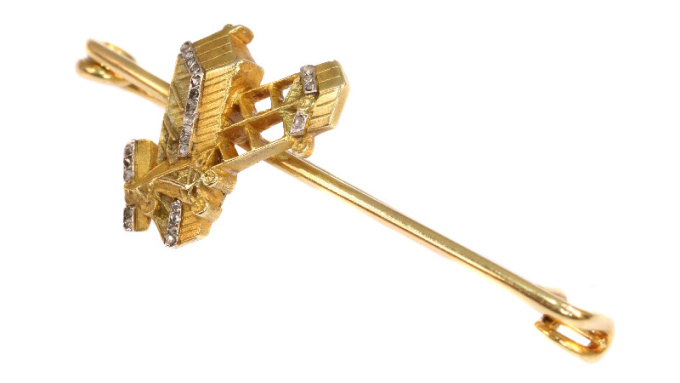Unique gold diamond aviation brooch commemorating Belgium's first manned motorized flight by Artista Desconocido