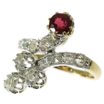 Late Victorian crossover ring with diamonds and ruby by Artista Sconosciuto