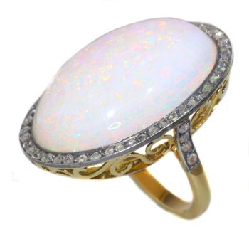 Vintage gold ring with humongous 30+ carat high quality opal and 56 rose cut diamonds by Unknown artist