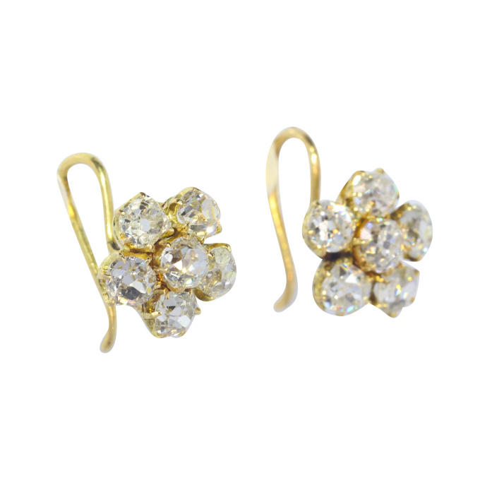 Vintage antique diamond earstuds with old mine brilliant cut diamonds by Artista Desconocido