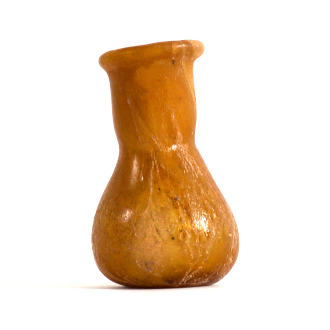 A Roman yellow glass unguentarium by Unknown artist