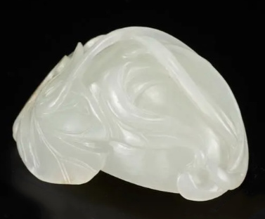 A white jade ‘Lotus Seedpod and Bug’ carving, Qing dynasty, 18th century by Artiste Inconnu